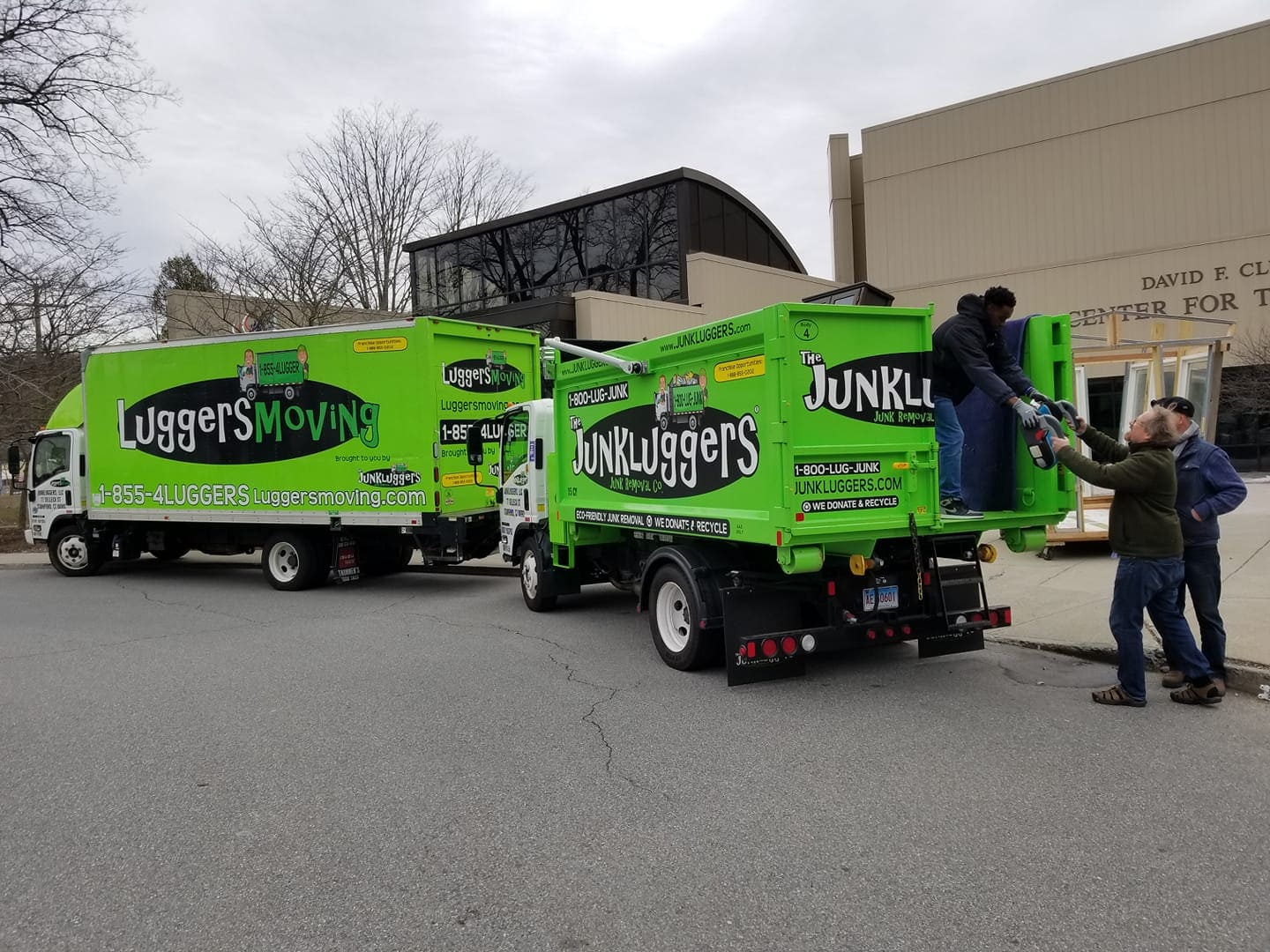 two trucks out side a school